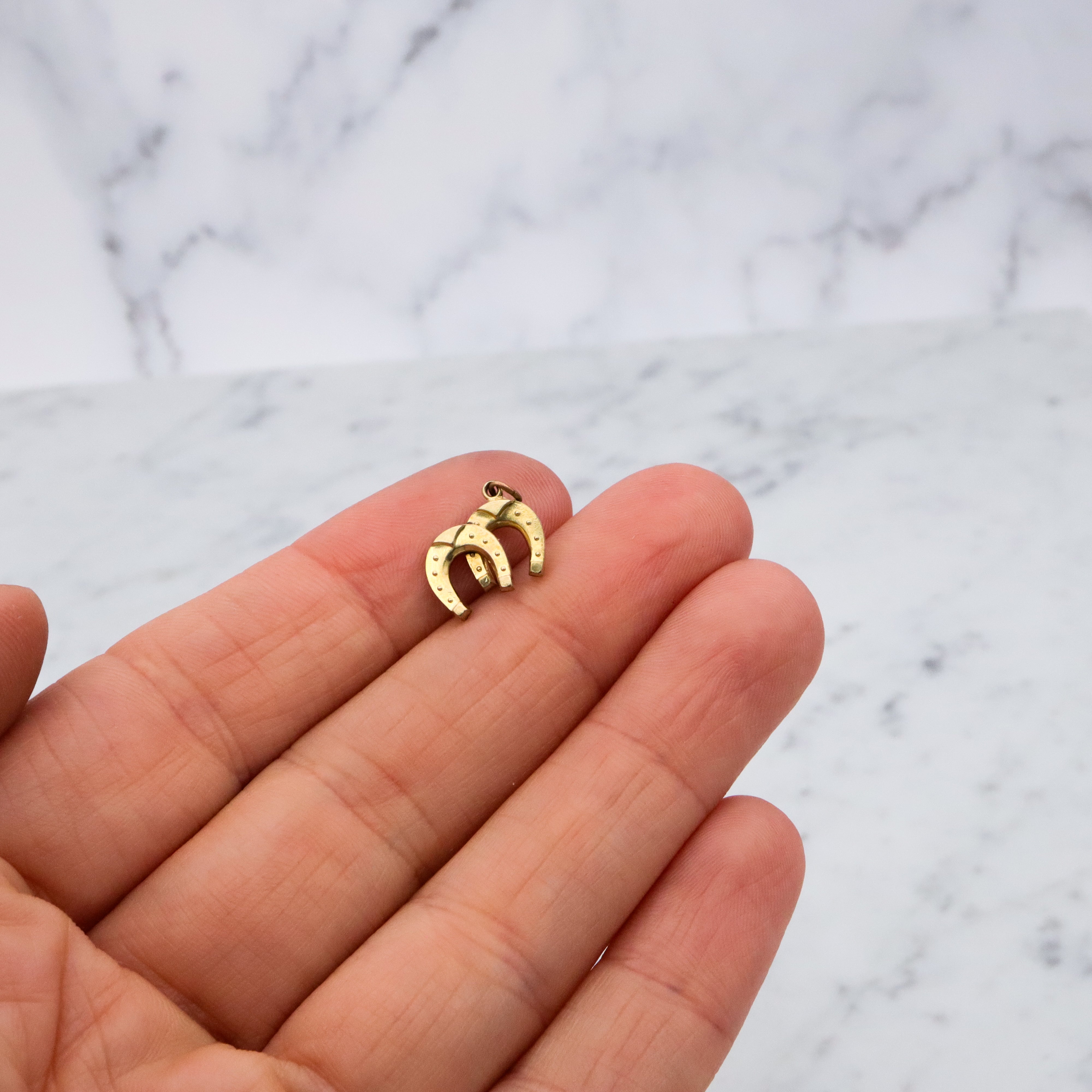 Antique rolled gold double horseshoe lucky charm pendant